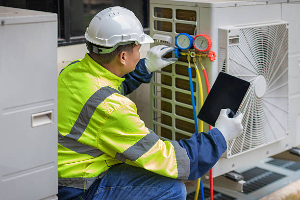 Professional Air Duct Cleaning technician working in Madras, OR